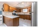 45 Gilbert Crescent, Red Deer, AB  - Indoor Photo Showing Kitchen With Double Sink 