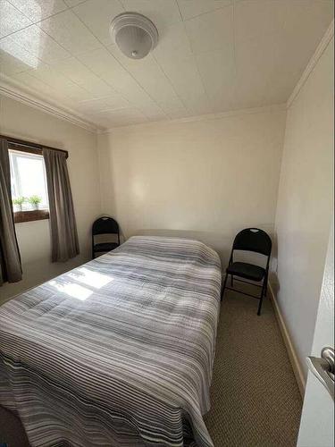 608 Rogers Avenue, Picture Butte, AB - Indoor Photo Showing Bedroom