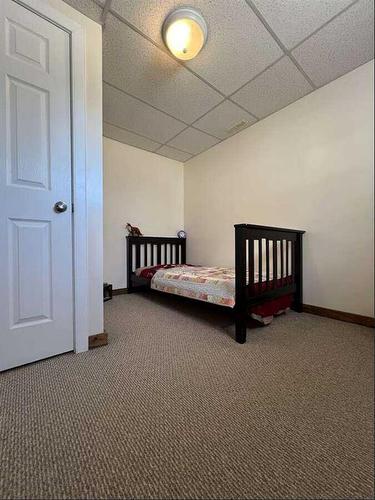 608 Rogers Avenue, Picture Butte, AB - Indoor Photo Showing Bedroom