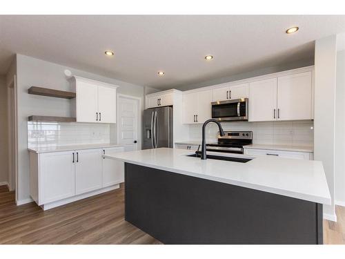 6312 58 Street, Ponoka, AB - Indoor Photo Showing Kitchen With Stainless Steel Kitchen With Upgraded Kitchen