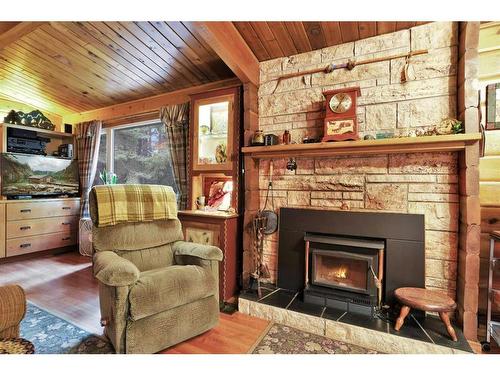 121-34408 Range Road 41, Rural Red Deer County, AB - Indoor Photo Showing Living Room With Fireplace