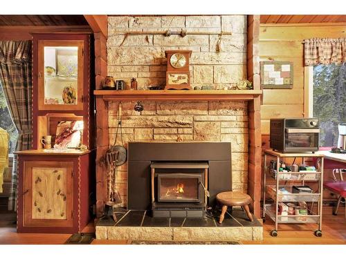 121-34408 Range Road 41, Rural Red Deer County, AB - Indoor With Fireplace