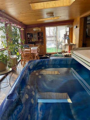 36009 Highway 2A South, Rural Red Deer County, AB - Indoor Photo Showing Other Room With In Ground Pool