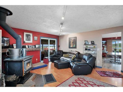 45040 Twp Rd 421A, Rural Ponoka County, AB - Indoor Photo Showing Living Room With Fireplace