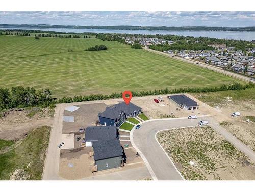 101 Gray Close, Sylvan Lake, AB - Outdoor With Body Of Water With View