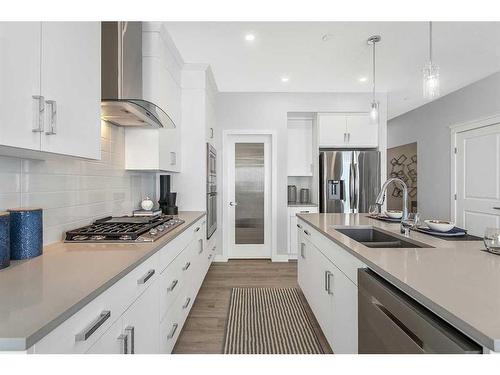 323 Creekstone Hill Sw, Calgary, AB - Indoor Photo Showing Kitchen With Double Sink With Upgraded Kitchen