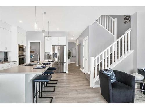 323 Creekstone Hill Sw, Calgary, AB - Indoor Photo Showing Kitchen With Upgraded Kitchen