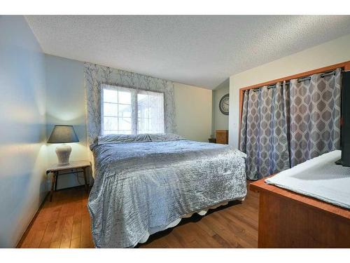 24027 Highway 595, Rural Red Deer County, AB - Indoor Photo Showing Bedroom