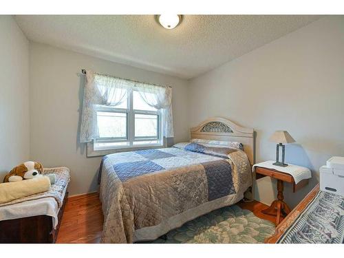 24027 Highway 595, Rural Red Deer County, AB - Indoor Photo Showing Bedroom