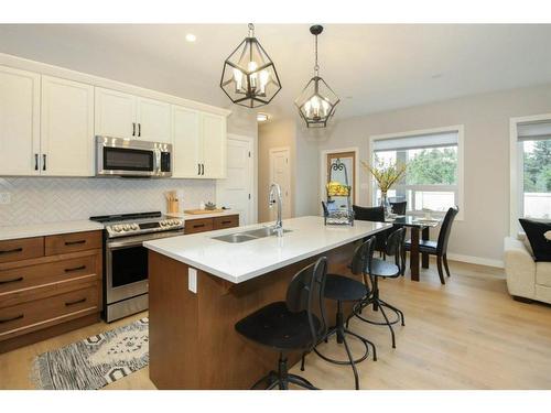 143 Ellington Crescent, Red Deer, AB - Indoor Photo Showing Kitchen With Double Sink With Upgraded Kitchen