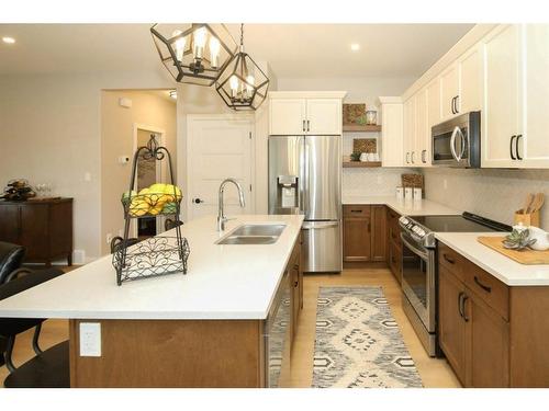 143 Ellington Crescent, Red Deer, AB - Indoor Photo Showing Kitchen With Double Sink With Upgraded Kitchen