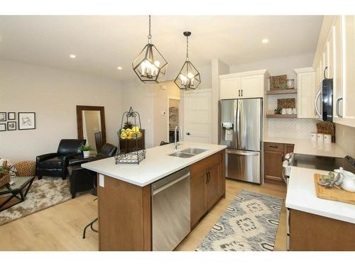 143 Ellington Crescent, Red Deer, AB - Indoor Photo Showing Kitchen With Double Sink With Upgraded Kitchen