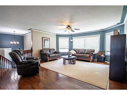 30 Country, Clive, AB - Indoor Photo Showing Living Room