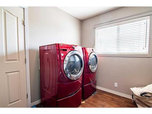 30 Country, Clive, AB - Indoor Photo Showing Laundry Room