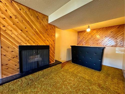 5902 55 Avenue, Red Deer, AB - Indoor With Fireplace