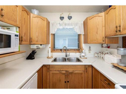47 Elder Street, Red Deer, AB - Indoor Photo Showing Kitchen With Double Sink