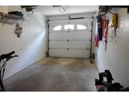 16B-32 Daines Avenue, Red Deer, AB - Indoor Photo Showing Garage