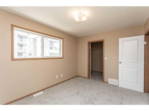 573-100 Jordan Parkway, Red Deer, AB - Indoor Photo Showing Other Room