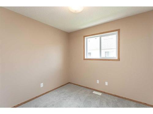 573-100 Jordan Parkway, Red Deer, AB - Indoor Photo Showing Other Room