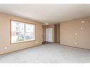 573-100 Jordan Parkway, Red Deer, AB  - Indoor Photo Showing Other Room 