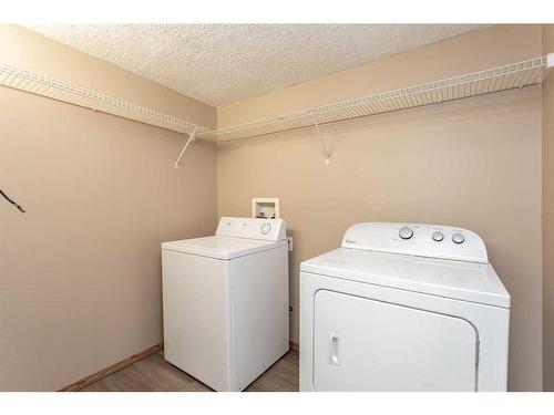 573-100 Jordan Parkway, Red Deer, AB - Indoor Photo Showing Laundry Room