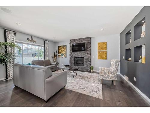 25 Lazaro Close, Red Deer, AB - Indoor Photo Showing Living Room With Fireplace