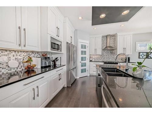 25 Lazaro Close, Red Deer, AB - Indoor Photo Showing Kitchen With Double Sink With Upgraded Kitchen