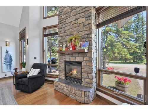 5012 38 Street, Sylvan Lake, AB - Indoor Photo Showing Living Room With Fireplace