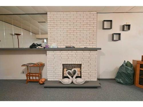 14 Ovington Close, Red Deer, AB - Indoor Photo Showing Other Room With Fireplace