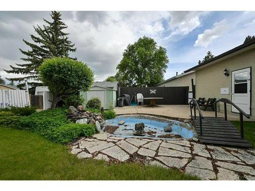 14 Ovington Close, Red Deer, AB - Outdoor With In Ground Pool With Backyard