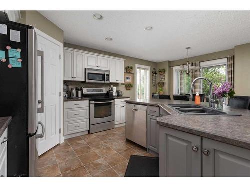 5606 28A Avenue, Camrose, AB - Indoor Photo Showing Kitchen With Double Sink