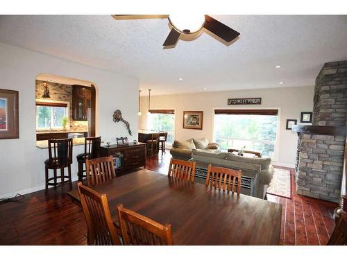 32015 292 Avenue East, De Winton, AB - Indoor Photo Showing Other Room With Fireplace