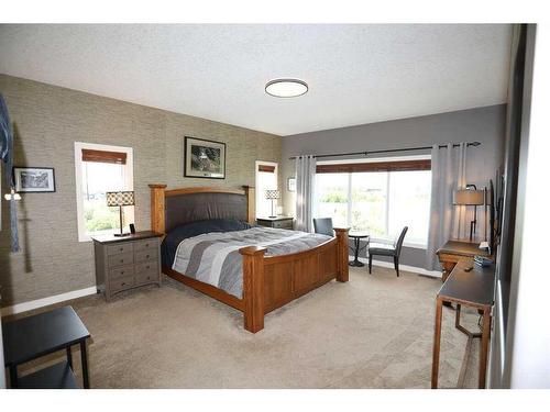 32015 292 Avenue East, De Winton, AB - Indoor Photo Showing Bedroom