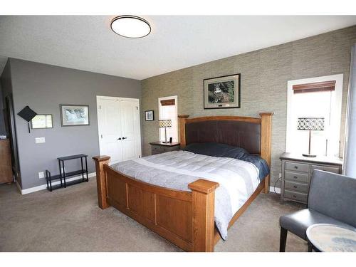 32015 292 Avenue East, De Winton, AB - Indoor Photo Showing Bedroom