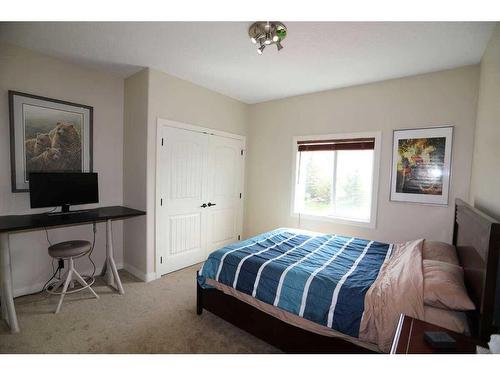 32015 292 Avenue East, De Winton, AB - Indoor Photo Showing Bedroom