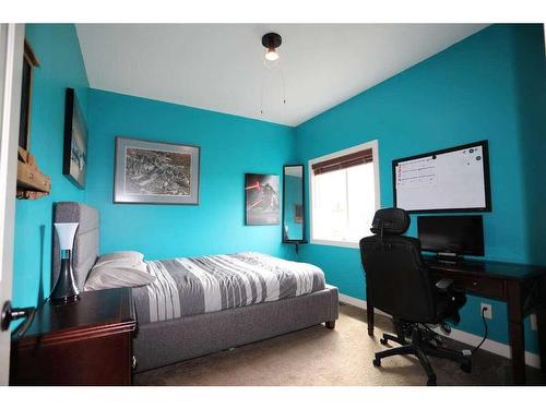 32015 292 Avenue East, De Winton, AB - Indoor Photo Showing Bedroom