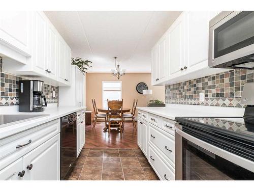 204-4522 47A Avenue, Red Deer, AB - Indoor Photo Showing Kitchen With Upgraded Kitchen