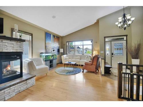 19 Oberg Court, Red Deer, AB - Indoor Photo Showing Living Room With Fireplace