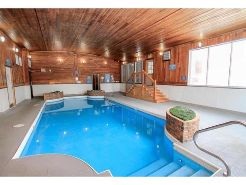 #267-5140 62 Street, Red Deer, AB - Indoor Photo Showing Other Room With In Ground Pool