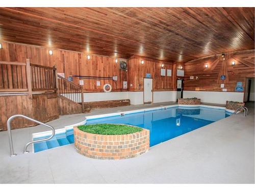 #267-5140 62 Street, Red Deer, AB - Indoor Photo Showing Other Room With In Ground Pool