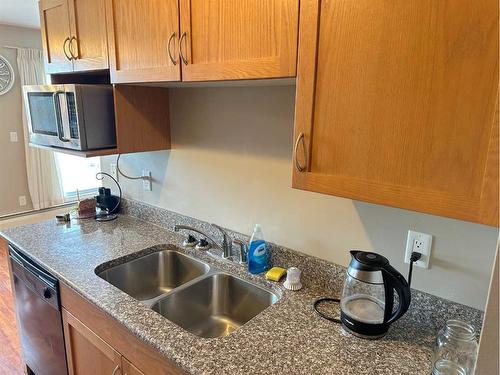 #267-5140 62 Street, Red Deer, AB - Indoor Photo Showing Kitchen With Double Sink