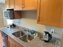 #267-5140 62 Street, Red Deer, AB  - Indoor Photo Showing Kitchen With Double Sink 