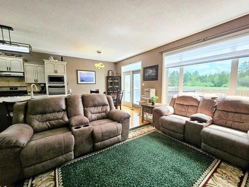 103-1600 Main Street Sw, Slave Lake, AB - Indoor Photo Showing Living Room