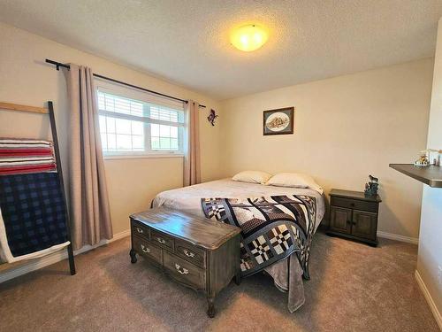 103-1600 Main Street Sw, Slave Lake, AB - Indoor Photo Showing Bedroom