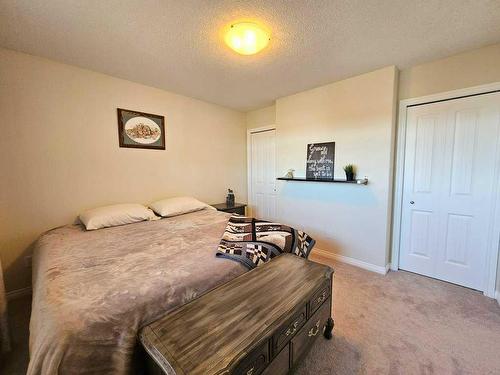 103-1600 Main Street Sw, Slave Lake, AB - Indoor Photo Showing Bedroom