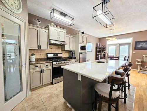 103-1600 Main Street Sw, Slave Lake, AB - Indoor Photo Showing Kitchen With Upgraded Kitchen