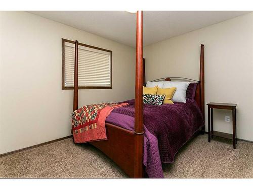 36 Hunter Road, Sylvan Lake, AB - Indoor Photo Showing Bedroom