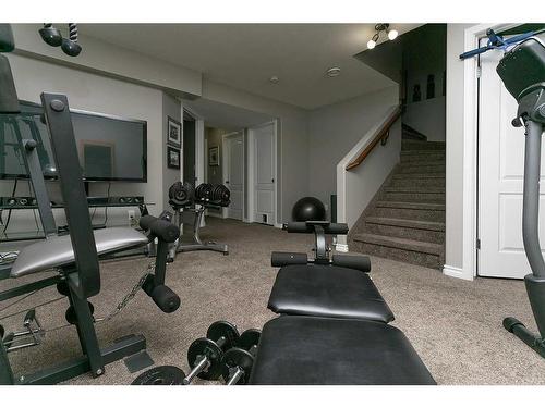 36 Hunter Road, Sylvan Lake, AB - Indoor Photo Showing Gym Room