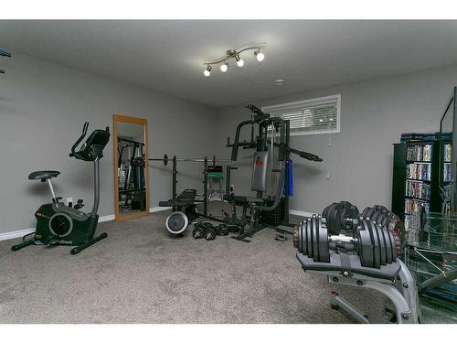 36 Hunter Road, Sylvan Lake, AB - Indoor Photo Showing Gym Room