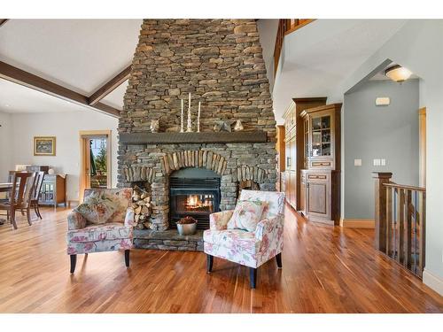 38041 Range Road 253, Rural Red Deer County, AB - Indoor Photo Showing Living Room With Fireplace